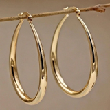 Loretta | Sophisticated Gold Round Earrings
